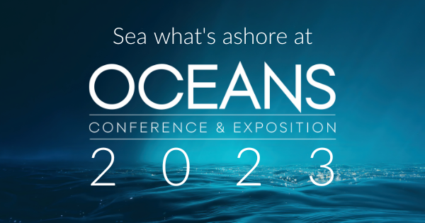OCEANS 2023 Conference graphic written in white on a reflection of the blue ocean floor